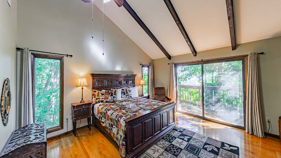 Primary bedroom with king bed, and deck access