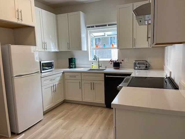 Fully equipped kitchen with utensils, plates, pot and pans.
Newly updated appliances.