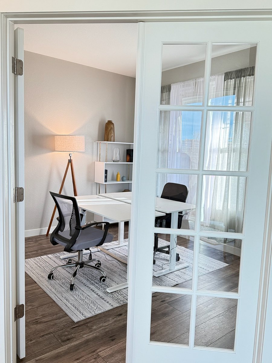 spacious Office with electric rise "standing desks"