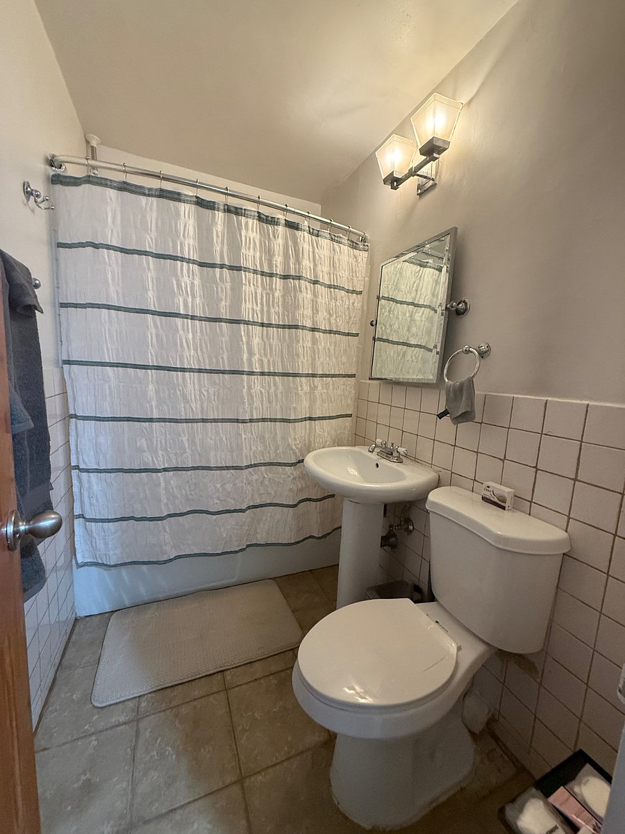 Bathroom directly outside of bedroom