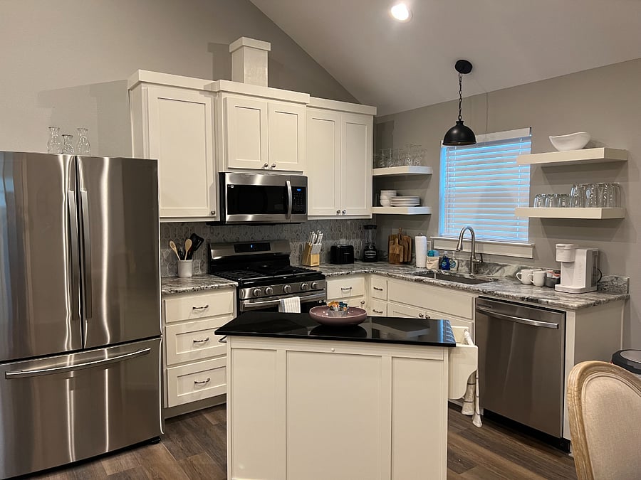 Kitchen with stainless steel appliances and granite countertops