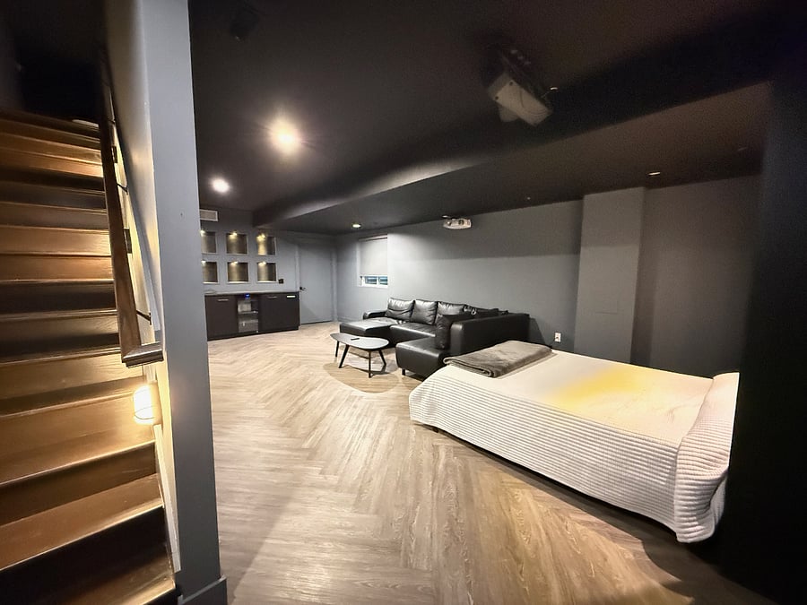 Lower level theater room and Third bedroom w/queen hideaway bed