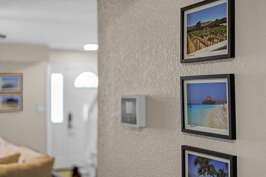 Immerse yourself in travel-inspired photography throughout the home, captured through the homeowners lens