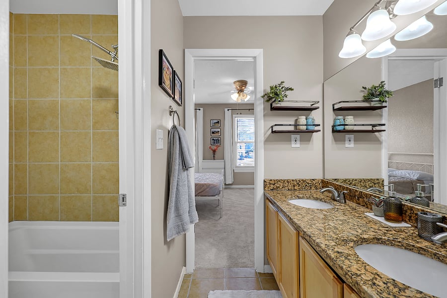 Enjoy the convenience of double sinks in the Jack and Jill bathroom.