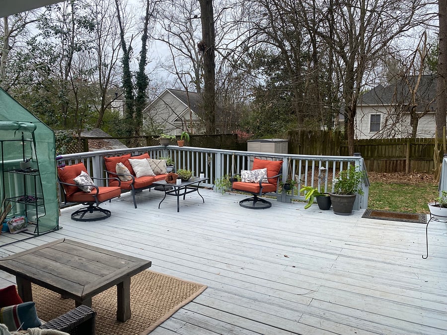 Fenced Backyard with large deck and ample seating areas
