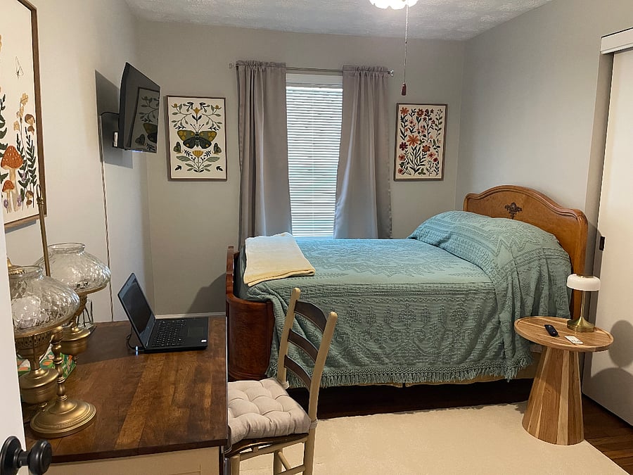 Smallest bedroom with full size bed. Please note laptop is not part of the rental.