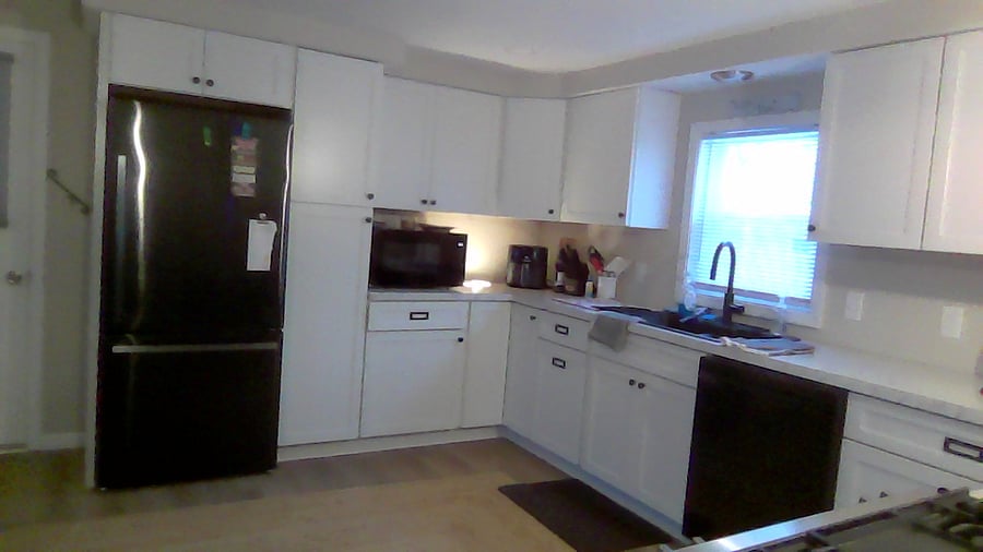 Kitchen with many amenities and new appliances.