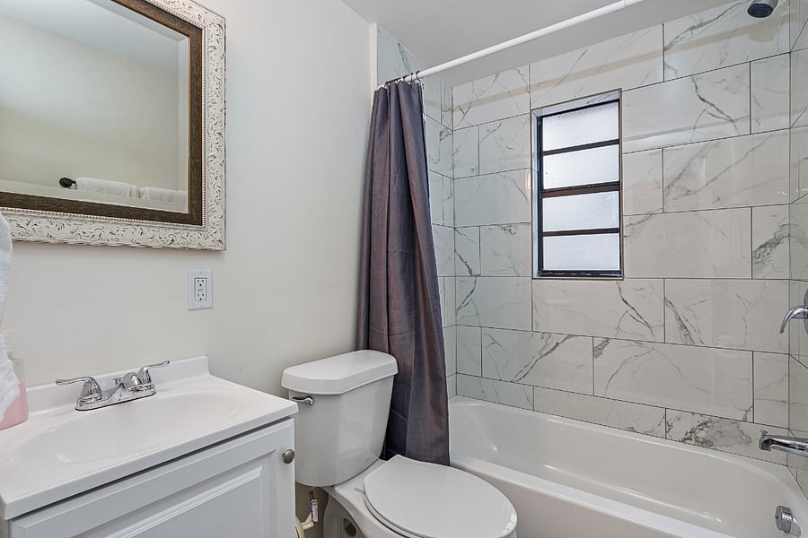 The full bathroom has a tub (with shower head), great for relaxing or getting the kiddos squeaky clean.