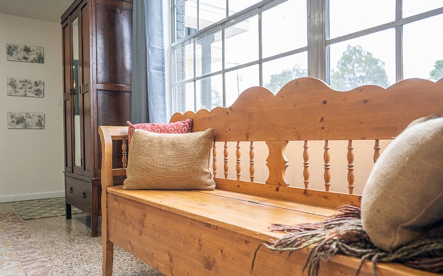 This bench in the living room provides additional seating.