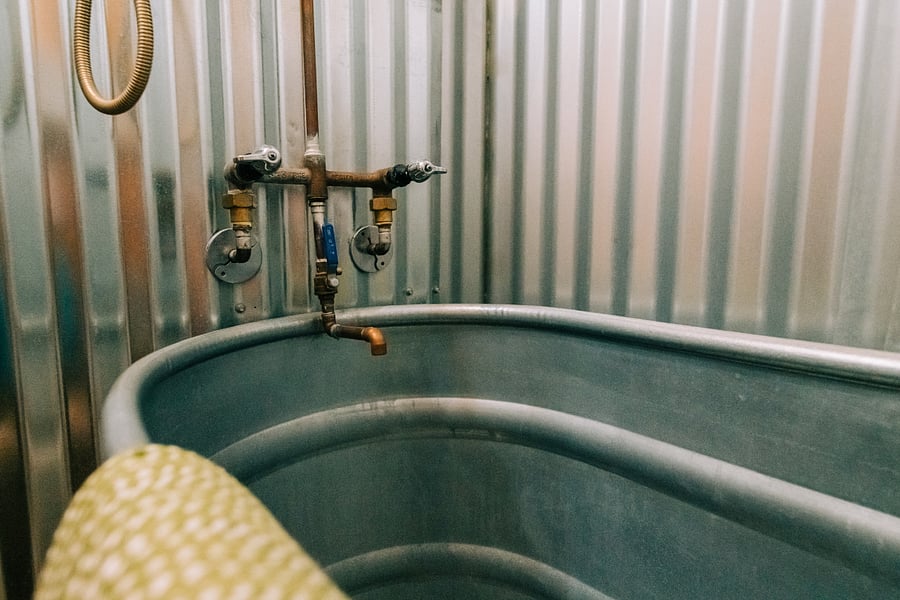 Full bathroom with deep tub and rain shower!