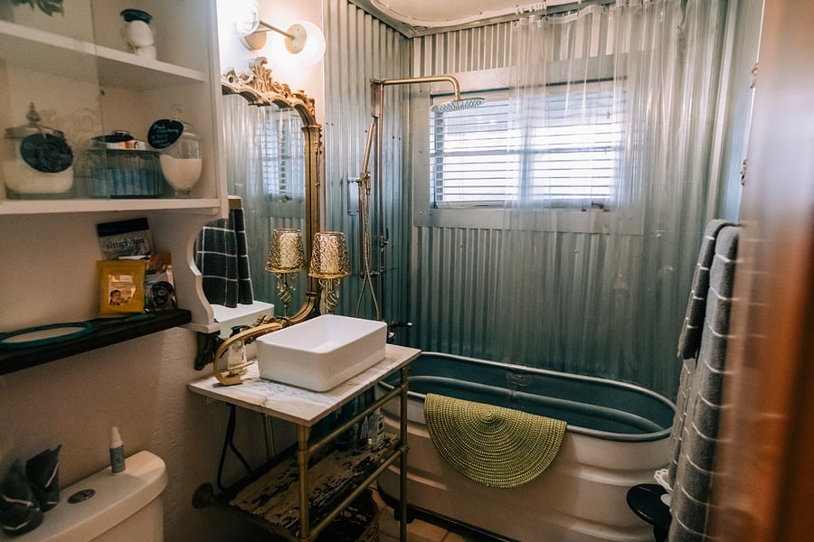 Full bathroom with deep tub and rain shower!