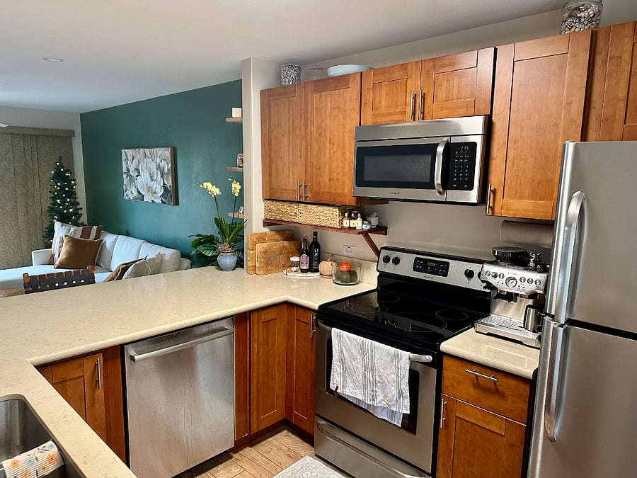 Shared kitchen with espresso machine, large counters and dishwasher