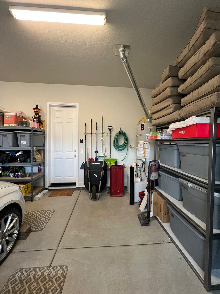 Garage with Storage Bins Available for Use