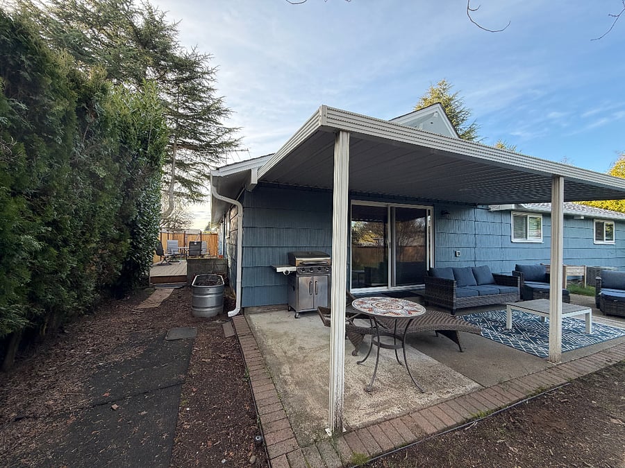 Backyard patio with gas grill