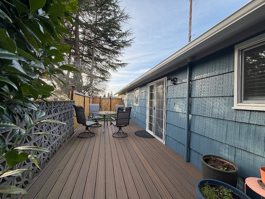Side deck with outdoor table seating