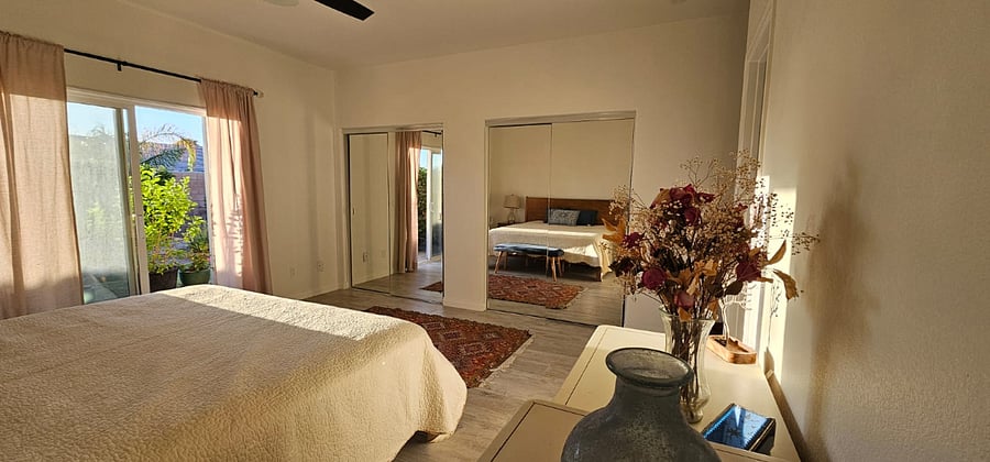 Master bedroom ,with access to back yard. 