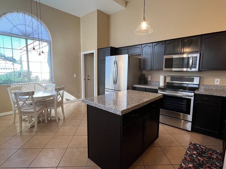 Kitchen with Table which 'self stores" a table leaf for expansion