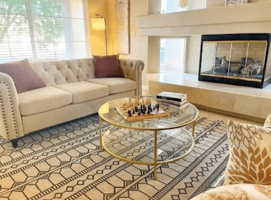 Cozy seating area with gas fireplaceperfect for evenings in during extended stays.