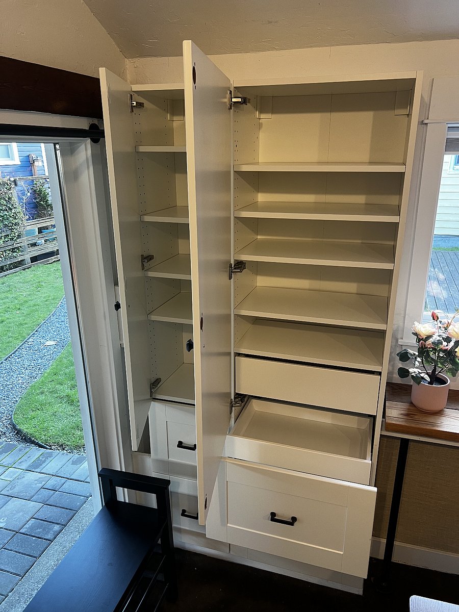 Tons of organization & storage in the dining area. This would make a great pantry and/or as an extra clothes dresser.