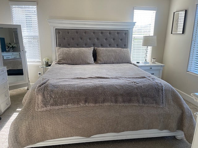 Master Bedroom, CA king size bed, ceiling fan, lighted vanity w/mirror, 6 drawer dresser, 40' Smart TV w/firestick