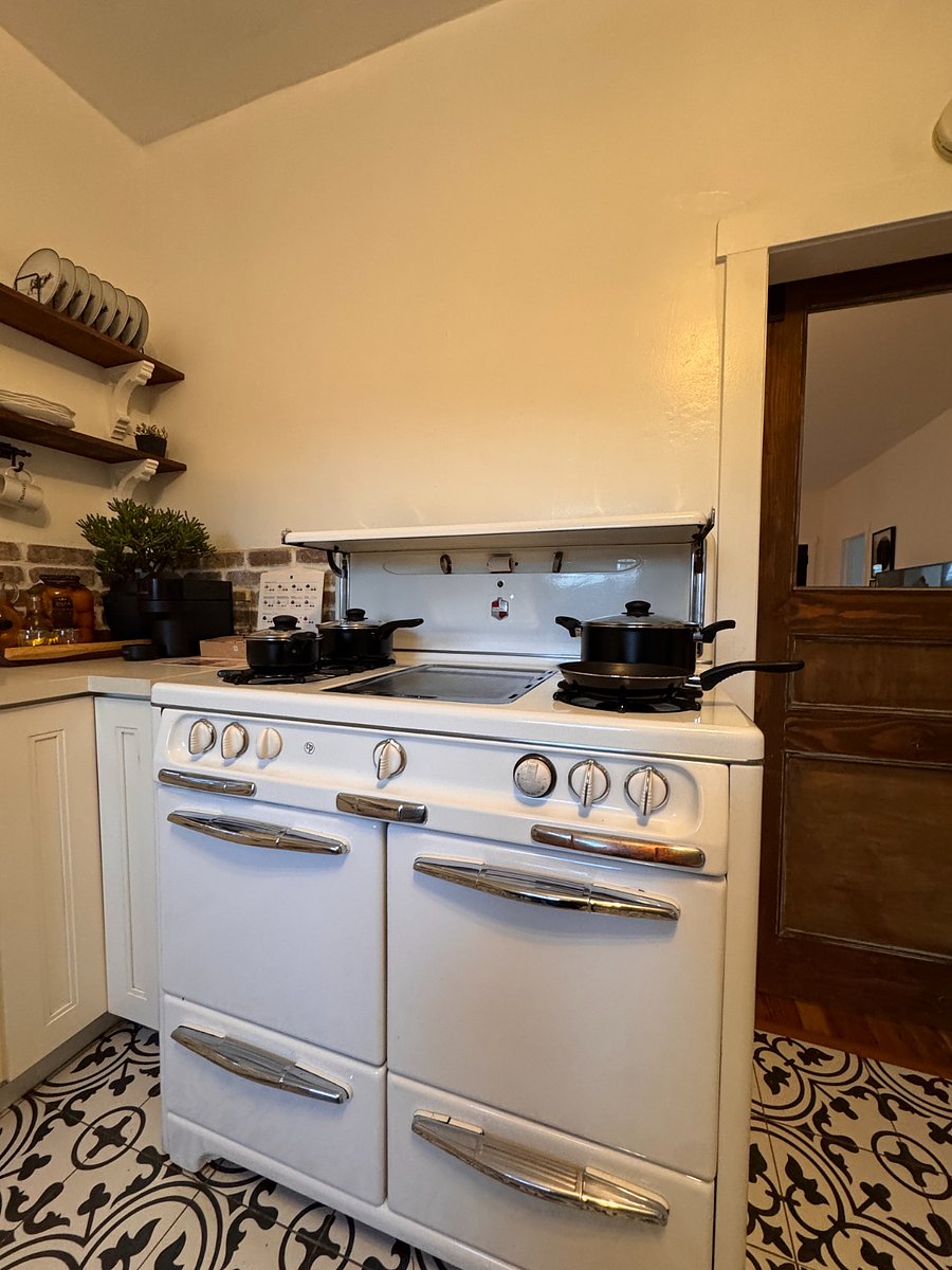 Vintage Wedgewood stove and oven with pots and pans ready for you to make some good meals. Microwave and taster also available.