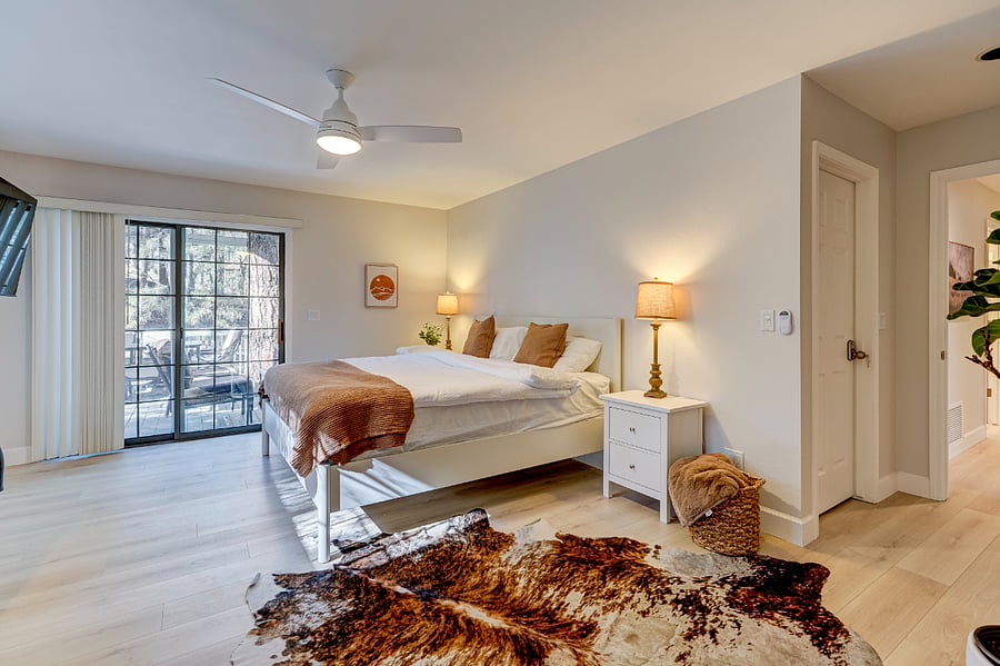 Third bedroom / primary bedroom with access to the bathroom and deck