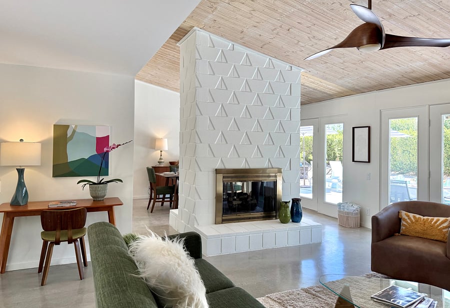 Living area with mid century modern fireplace.