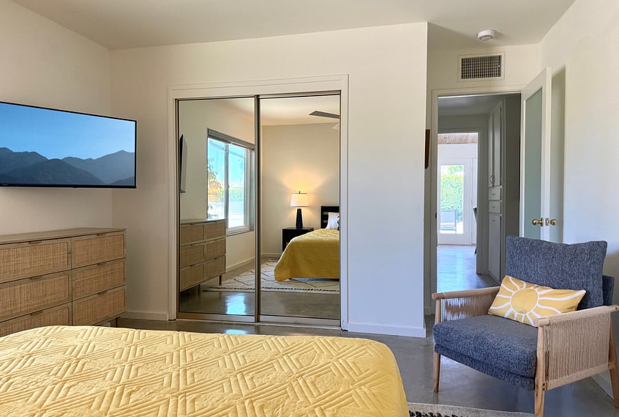 Second bedroom with smart TV.