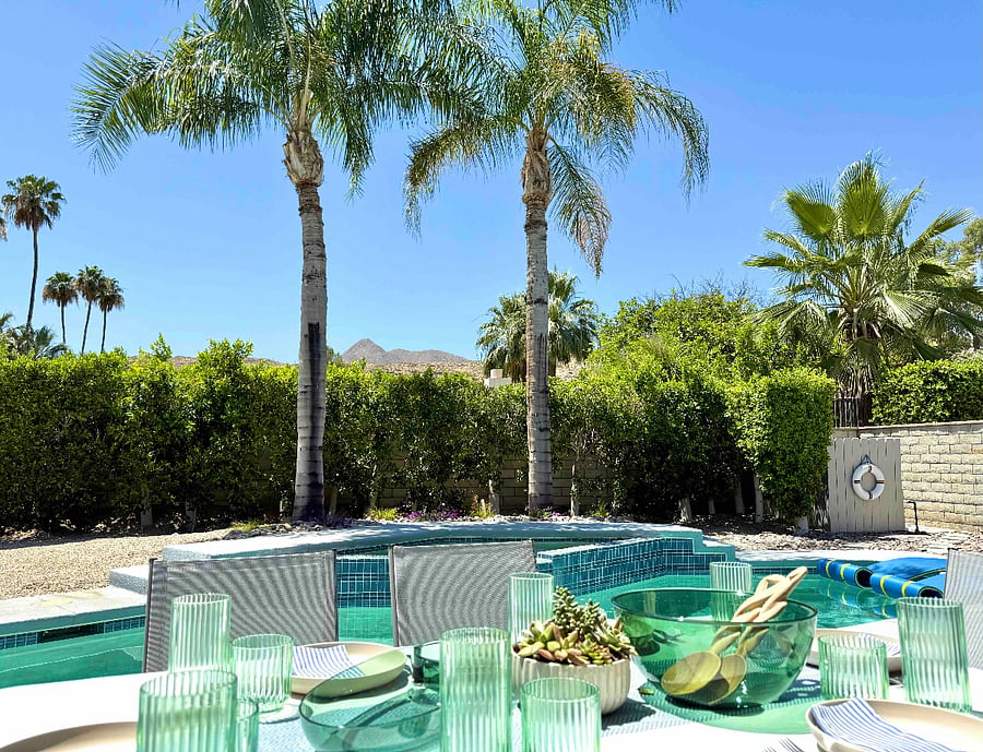 Outdoor dining poolside with great views.