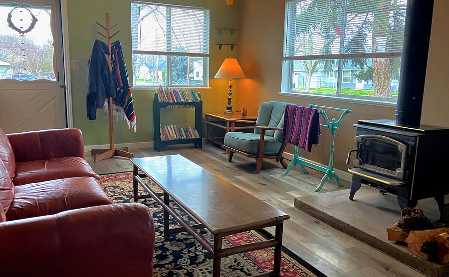 Cozy living area with wood burning stove