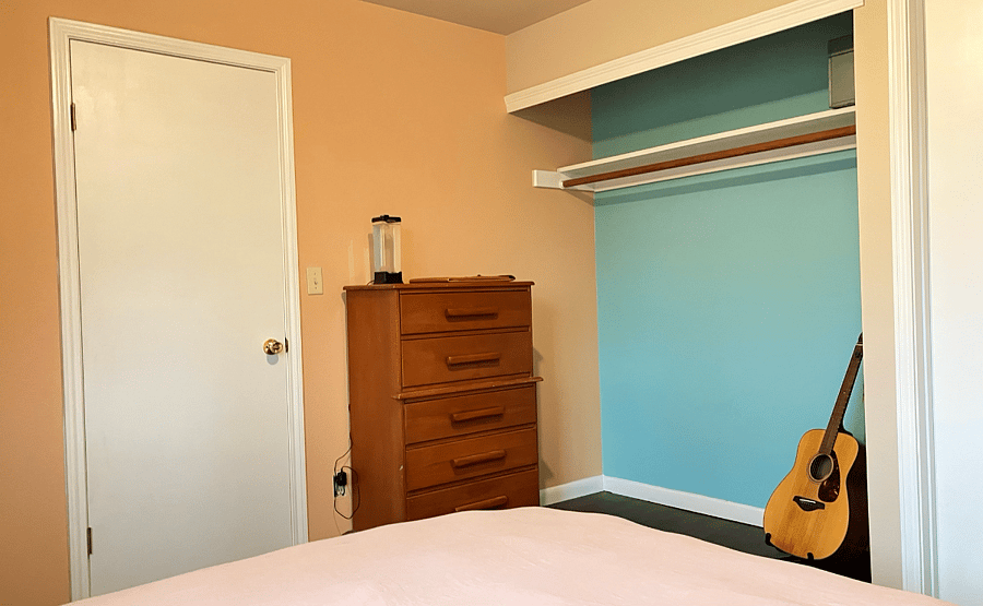 Bedroom 1 with closet and dresser
