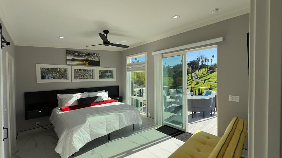 Bedroom 1. With 8 feet sliding glass doors. With access to the deck.