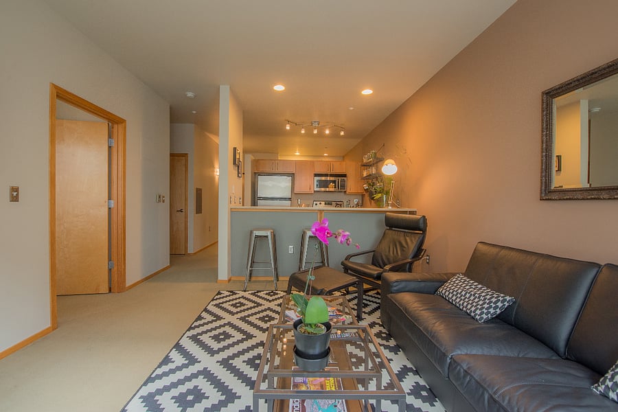 Open living area with dining bar, ideal for daily living