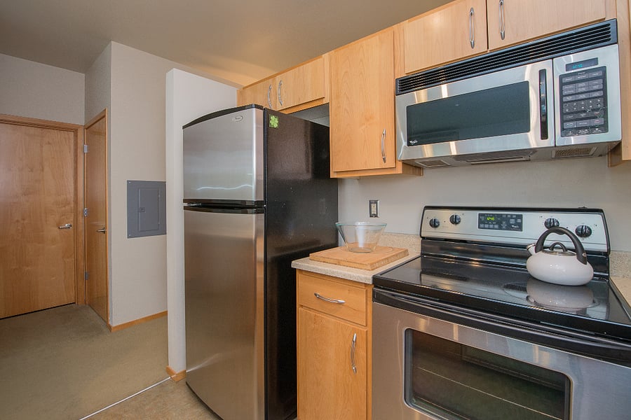 Fully equipped kitchen with stainless steel appliances
