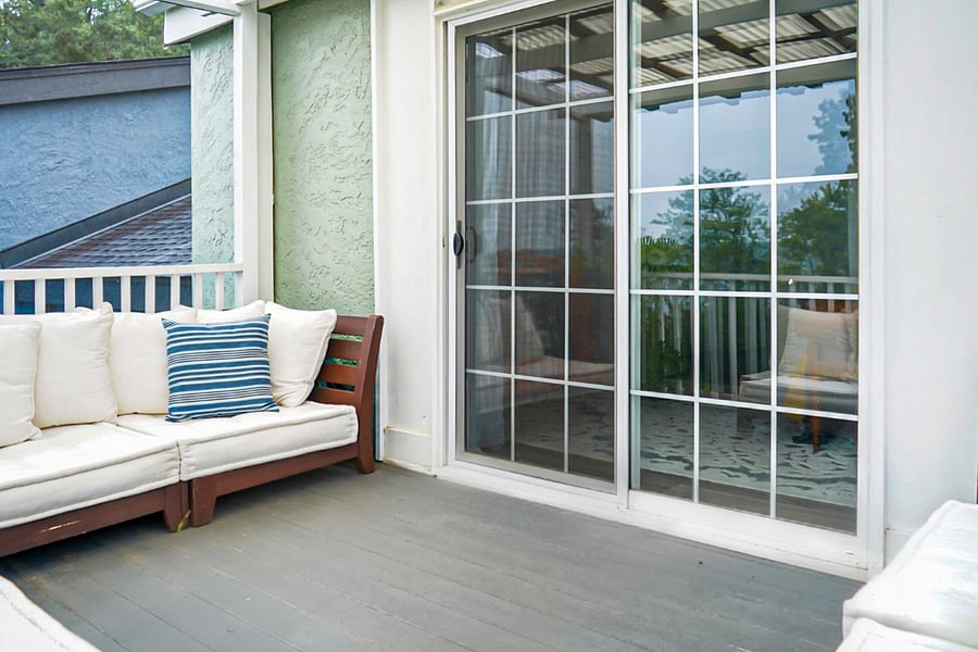 A cozy balcony seating area, perfect for relaxing and enjoying the fresh air.