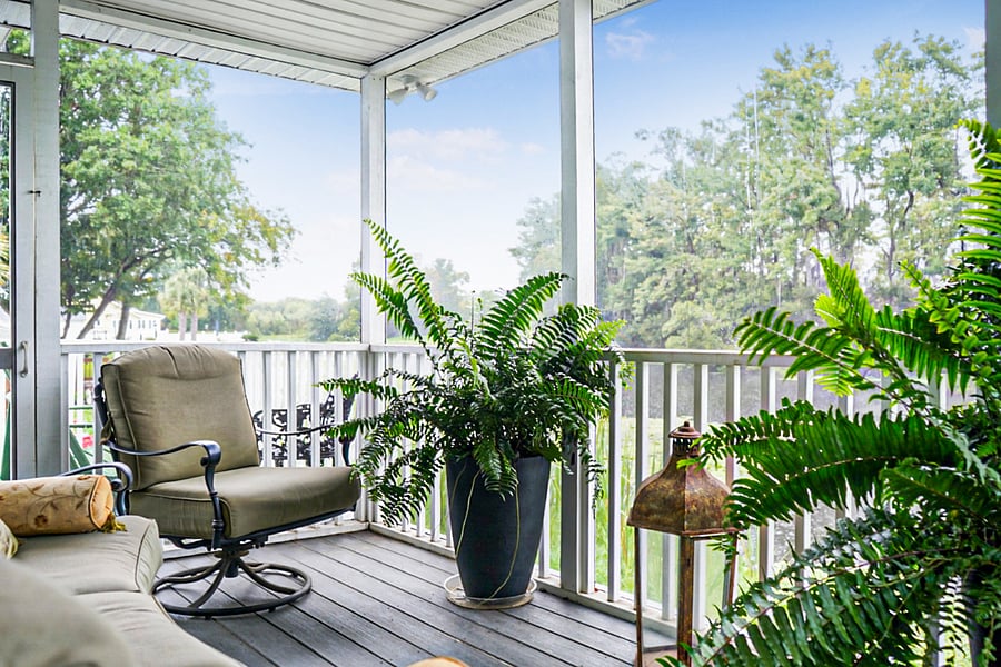 A peaceful balcony with comfortable seating, perfect for morning coffee or evening relaxation.