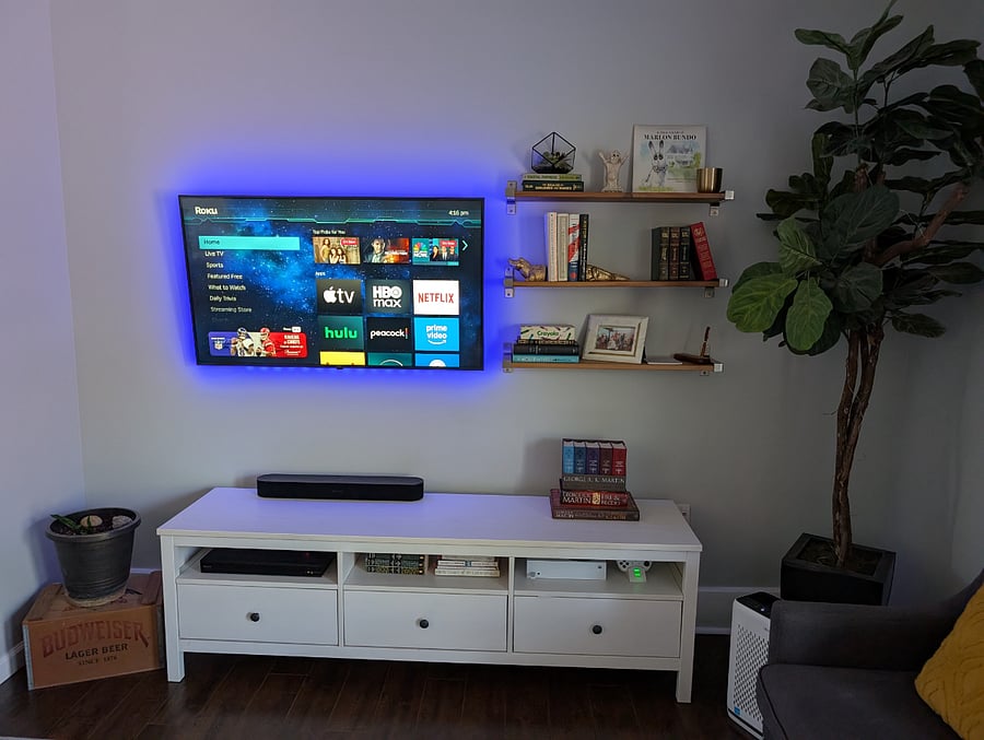 55" UHD LG Smart TV with Roku, 4k UHD BluRay Player, Bias Lighting, and Sonos Surround Sound.