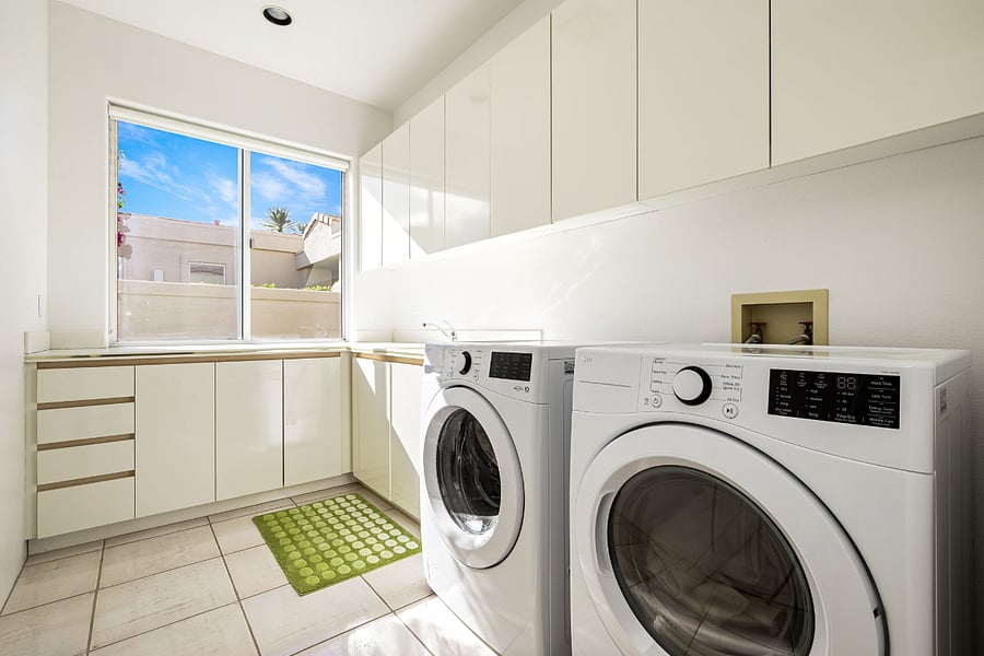 Laundry room with new Washer and Dryer, utility sink