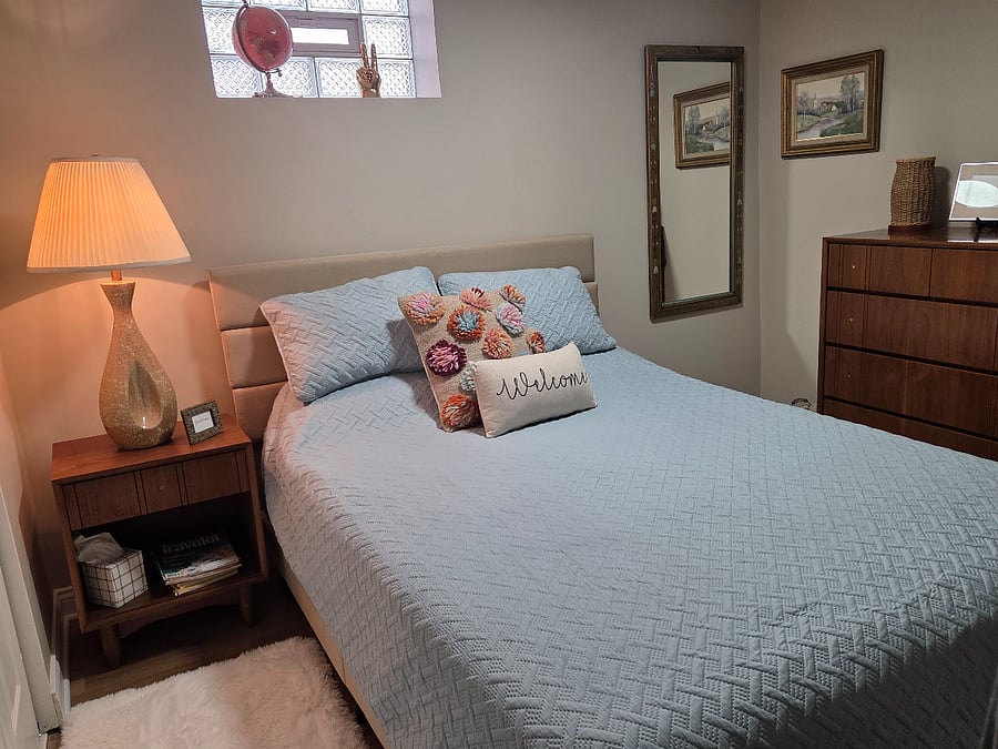 Bedroom with MCM dresser and large double closet