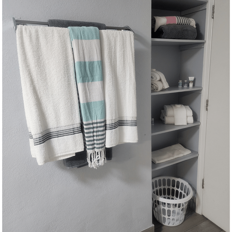 Fresh, soft regular bath towels are provided for everyday comfort, along with additional Turkish towels that offer a light, spalike touch for an elevated stay.