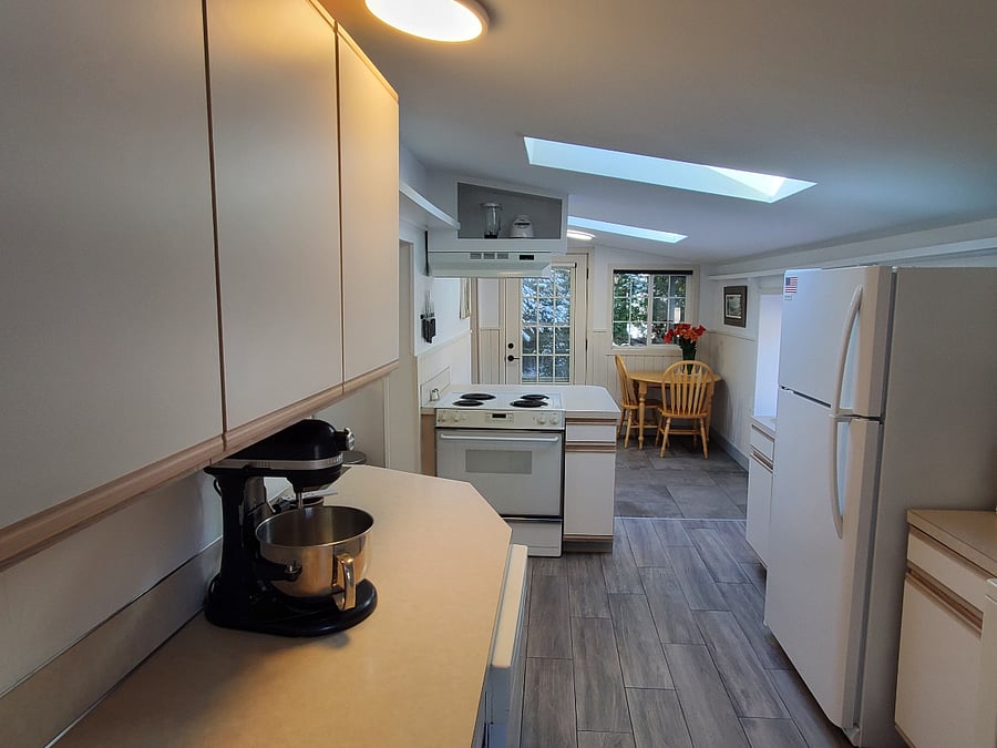 Looking from the office towards the dining room. Washer and dryer are on the right.
