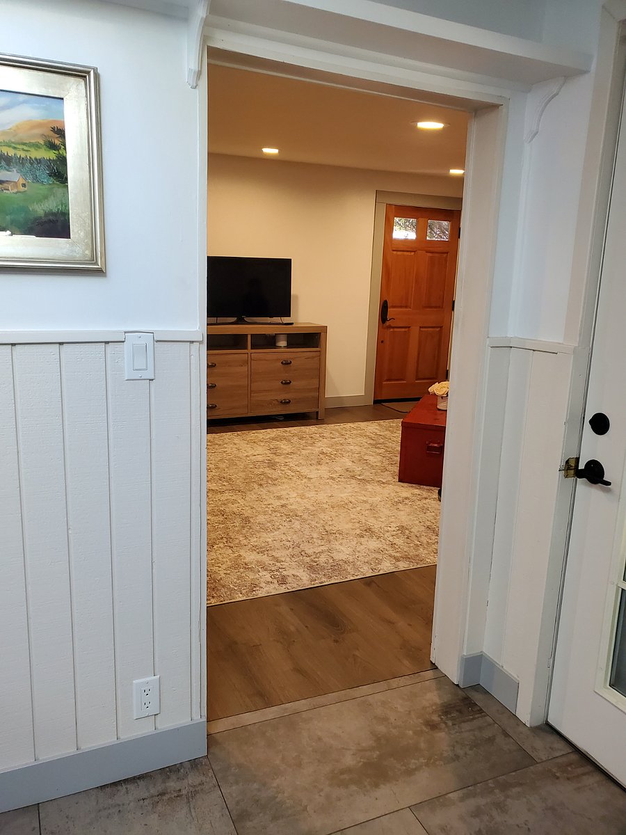 Looking towards the front door from the kitchen doorway