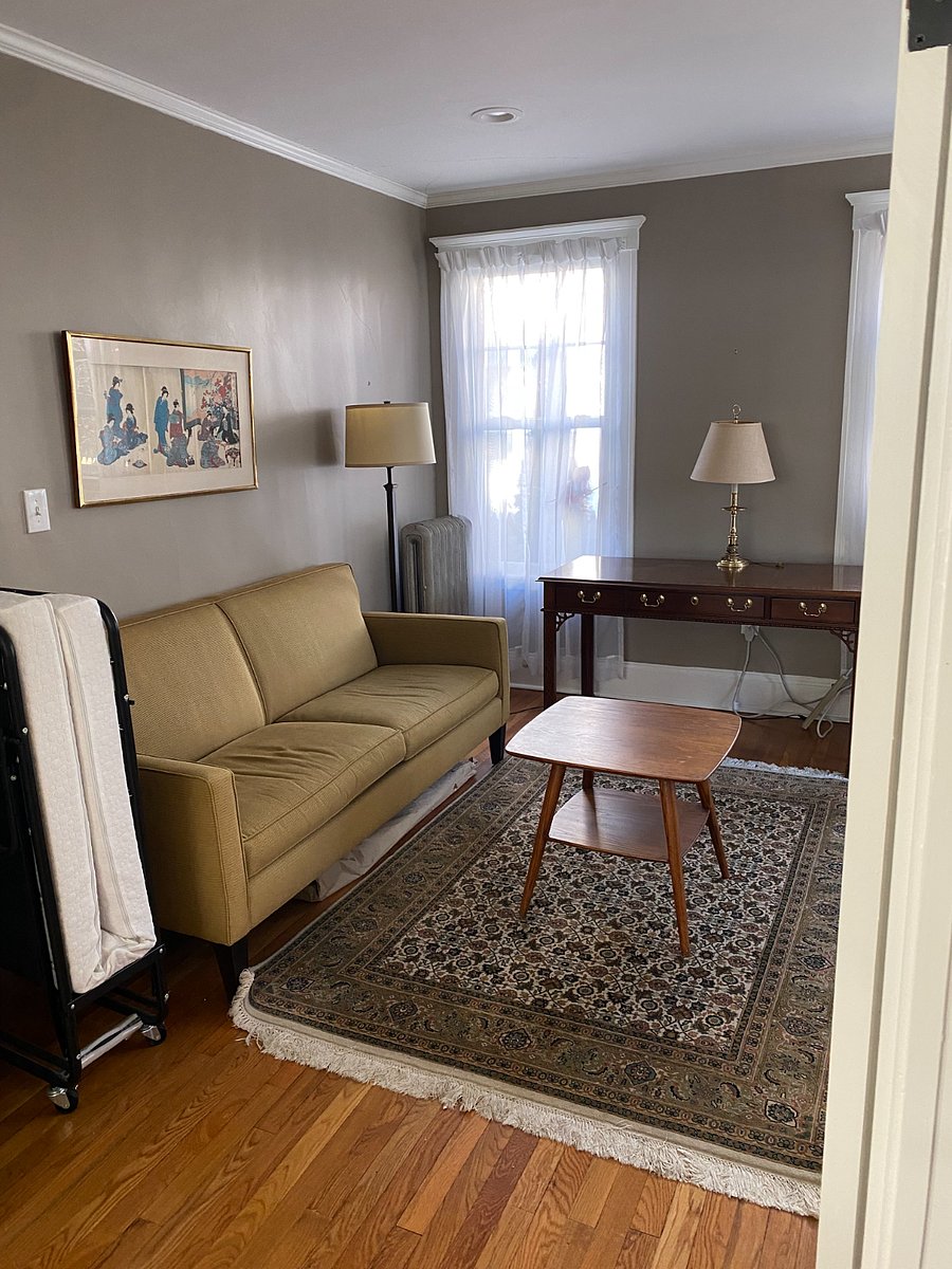Office with desk, couch and smart TV (Roku)