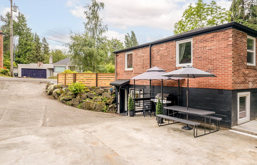 Expansive and private driveway.  We have safety lights to illuminate your walk inside.  Enjoy the BBQ area with a gas grill, seating for 8 and a place to rest while grilling your meal.