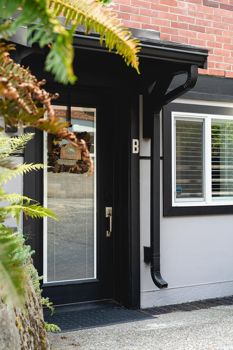 The private front door has security lights for your safety and security.  Front door and window have blinds to block out the daylight.