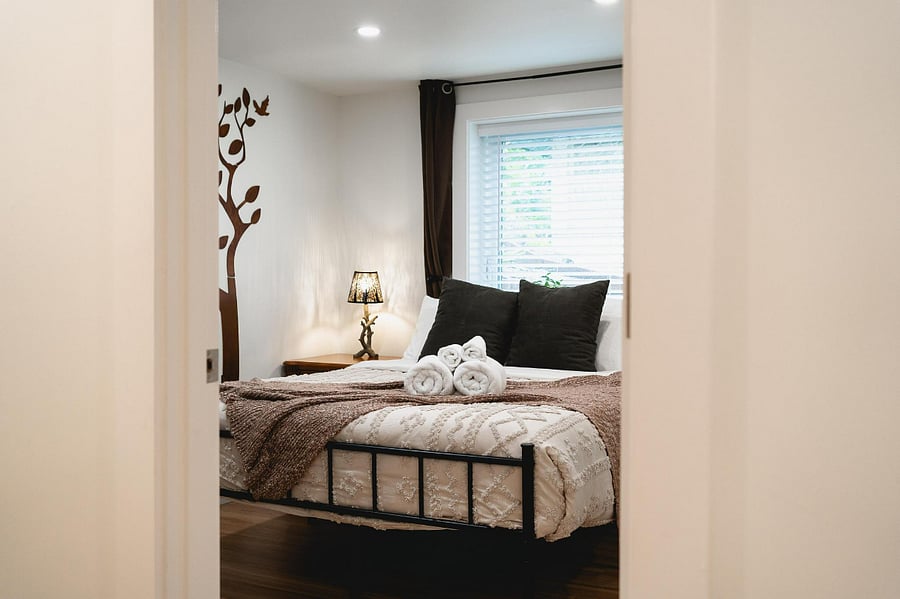 The Tree room:
- Upgraded memory foam queen be
- Mirrored closet doors
- Dresser and additional storage
- Blackout curtains, sound machine and phone charger