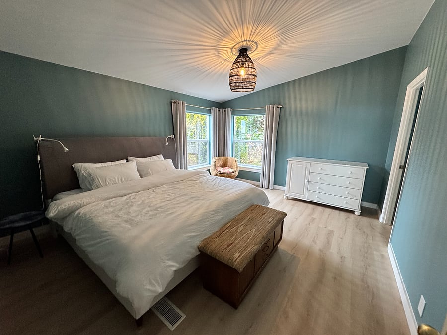 Primary bedroom with king size bed.