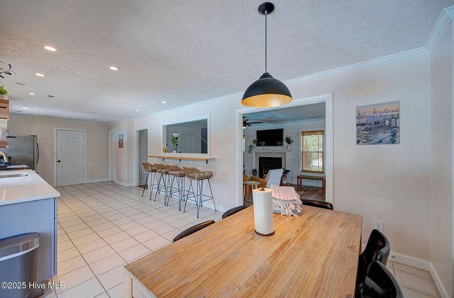 Open, fully equipped kitchen with modern appliances and plenty of counter space, seamlessly connected to the living area for easy cooking and gathering.