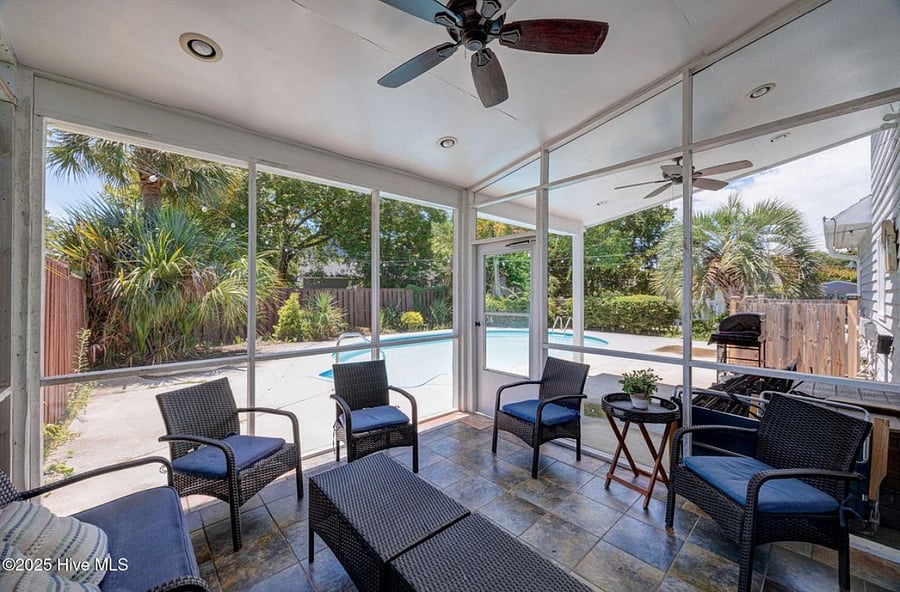 Inviting outdoor patio with comfortable lounge seating and serene views perfect for coffee, reading, working, or gathering with friends and family.
