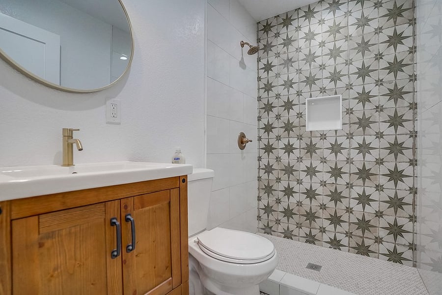 Full shower with small curb.